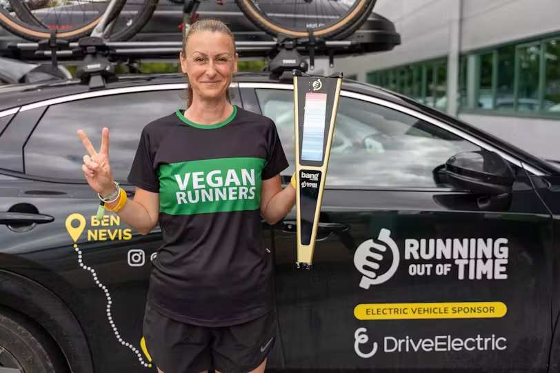Victoria Hatch, who ran stages 300, 302 and 303 on the Running Out of Time event, with the all-electric Nissan Ariya support team vehicle sponsored by DriveElectric